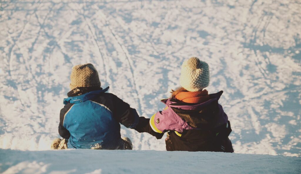 The current image has no alternative text. The file name is: kids-playing-in-the-snow-1-1.jpg